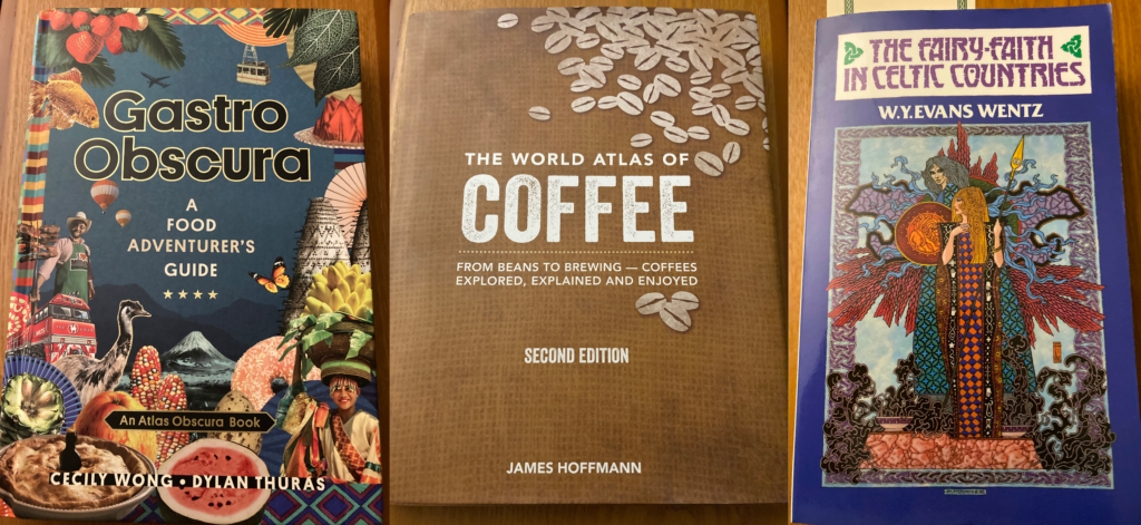 Books from Left to Right: Gastro Obscura, The World Atlas of Coffee, The Fairy-Faith in Celtic Countries