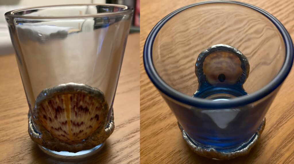 Front and back view of Shot glass with a Black Pearl from Waterhawk Creations